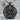 Libra Scales Medallion Pendant, black rhodium, front product view on wood