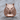 Angry Wolf Ring, rose gold, front view on wooden surface