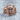 Aztec Warrior Death Mask Ring, rose gold plated, angled studio product photo