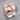 Pardon Crucifix Scrollwork Ring, rose gold, product photo on stone