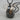 Quartz Fish Hook Pendant, black rhodium plated, front studio product photo