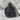 Triskele Spiral Enamel Pendant, black rhodium, front studio view