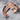Raven Folded Wing Bracelet in rose gold, studio product photo