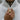 Garnet Rosette Pinky Ring in gold vermeil, worn on model hand