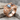 Labradorite Garnet Rivet Ring in rose gold, angled product photo