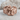 Fallen Angel Ring, rose gold, front product view resting on stone