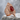 Masonic Archer Zihgir Ring, rose gold, front view on stone surface