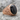 Masonic Black Onyx Ring, rose gold, product photo on stone surface