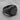 Cracked Round Signet Ring, black rhodium, product photo on stone surface