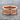 Semper Fidelis Eagle Ring, rose gold finish, front view on stone surface