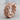 Floral Cuban Ring, rose gold, angled view on wood surface