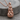 Astronaut on moon pendant, rose gold, front product view on wood