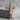 Holy Trinity Crucifix Pendant, rose gold, front view on stone