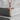 Wood Grain Crucifix Pendant, rose gold, product photo on stone