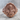 Saint Joseph Child Jesus Ring, rose gold plated, front view on stone surface