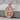 Saint Hubert Medal Pendant, rose gold, product photo on stone with chain