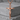 Crucified Christ Pendant, rose gold, product photo on pedestal
