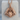 Wolf and Raven Pendant, rose gold, front product view on display pedestal