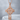 Knotwork Celtic Cross Pendant, rose gold, front view on stone block