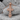 Three Bar Orthodox Cross Pendant, rose gold, product photo on stone