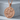 Rooster Medallion Pendant, rose gold, product photo on stone stand