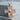 Ave Maria Cross Pendant, rose gold, front view on stone pedestal