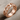Curb Chain Ring, rose gold, product photo on fabric