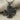 Beaded Celtic Cross Pendant, oxidized silver, front view on fabric