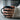 Cayman Crocodile Ring, rose gold, worn on model hand holding mug