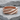 Hexagonal Spiral Ring, rose gold, front product photo on stone