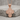 Crucifixion Scene Cross Pendant, rose gold, product photo on stone