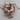 Strutting Rooster Pendant, rose gold finish on wood surface