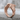Swooping Eagle Ring, rose gold, angled product view on concrete