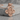 Christ Pantocrator Cross Pendant, rose gold, front view on stone pedestal