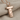 Göbeklitepe Pillar Pendant, rose gold, product photo on linen