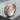 Grapevine band ring, rose gold plated, angled product view on wood