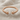 Open Rope Sphere Ring, rose gold finish, product view on linen