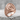 Elif Waw Relief Ring, rose gold finish, product view on stone surface
