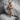 Wave dragon pendant in rose gold finish, front view on stone