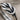 Infinity Knot Loop Ring in oxidized silver, angled close-up view