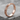 Acanthus Leaf Ring, rose gold, product photo on stone