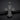 Engraved silver cross pendant with Templar Knight floral scrollwork and beaded border, resting on a dark slate surface.