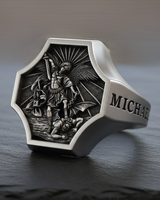 Side view of silver Archangel Michael ring featuring engraved MICHAEL text on the shank and polished finish