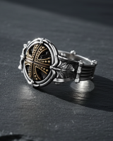 Side profile of the handcrafted silver knight cross ring, showcasing the ornate carvings and leaf patterns on the band.