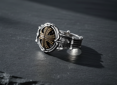 Side profile of the handcrafted silver knight cross ring, showcasing the ornate carvings and leaf patterns on the band.