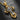 Angled view of gold vermeil and silver crucifix pendant showing intricate relief work and religious symbols
