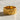 Close-up front view of the gold Aries ram ring highlighting the beautifully textured background and polished borders