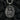 Front view of oxidized 925 sterling silver Saint Uriel pendant holding torch and scroll on black coal background