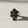 Front view of silver Egyptian Ankh ring featuring intricate black stone pave details on oxidized background