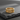14K gold vermeil tree branch ring with intricate openwork design on textured stone
